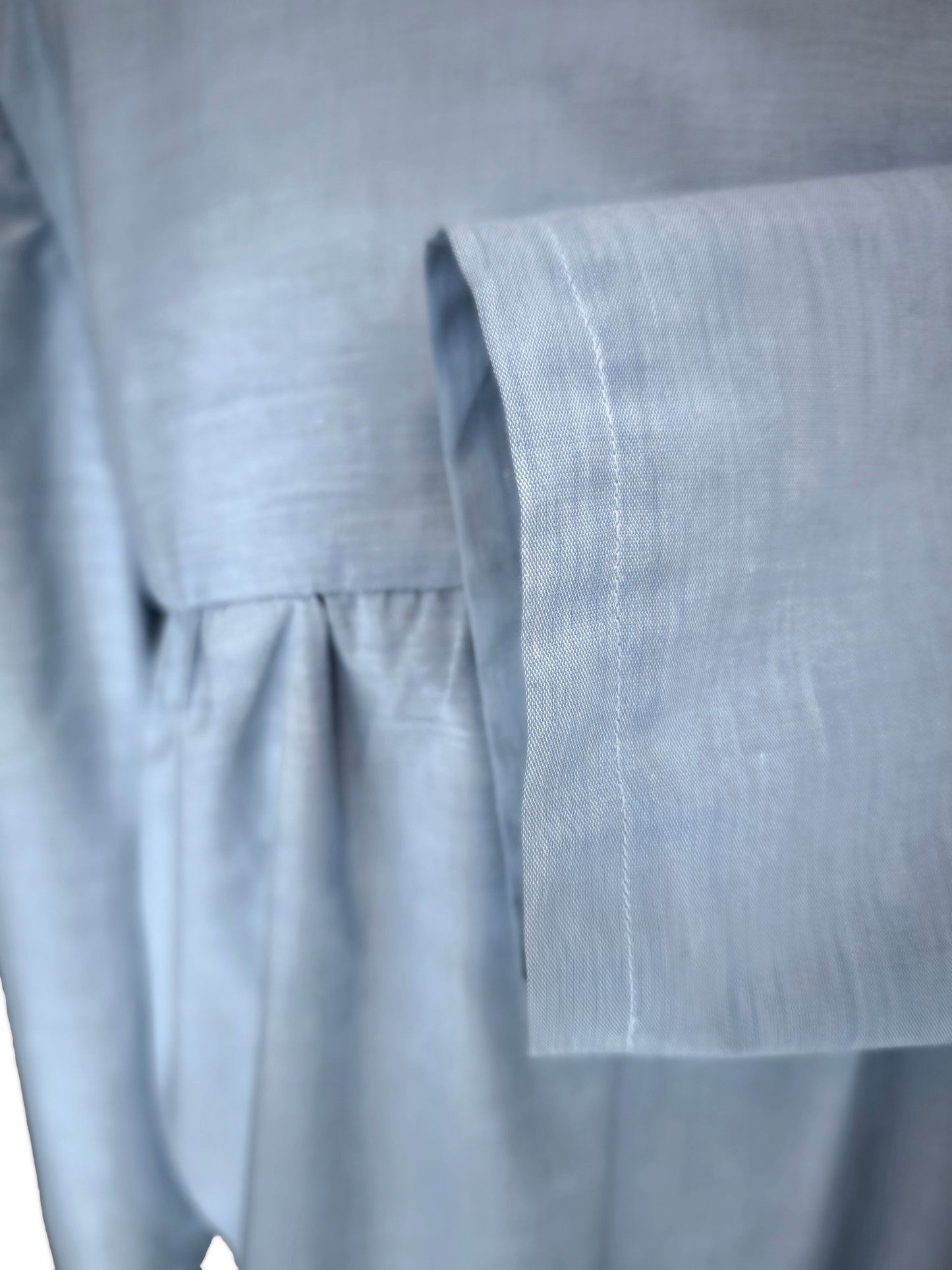 Blue long-sleeved blouse