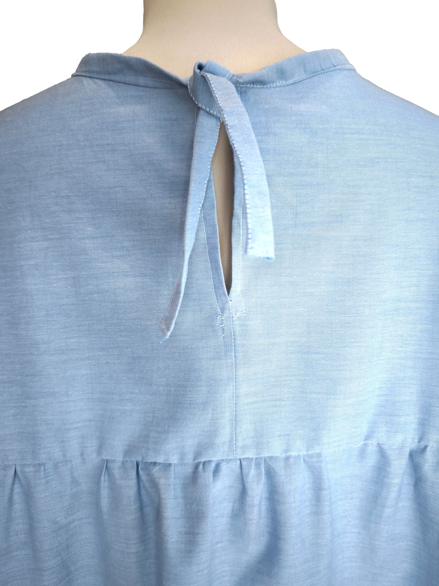 Blue long-sleeved blouse